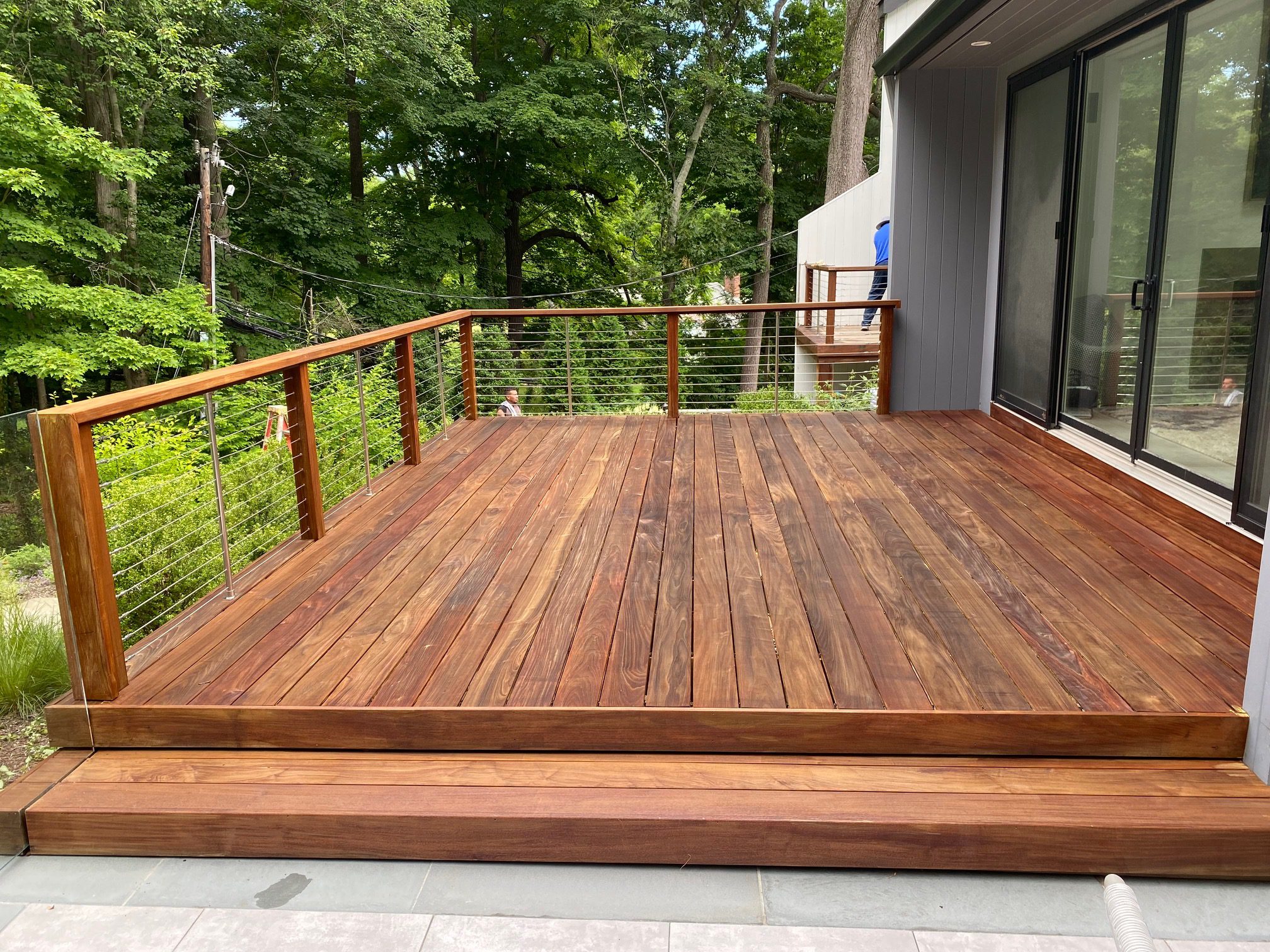 Modern wooden deck with cable railing