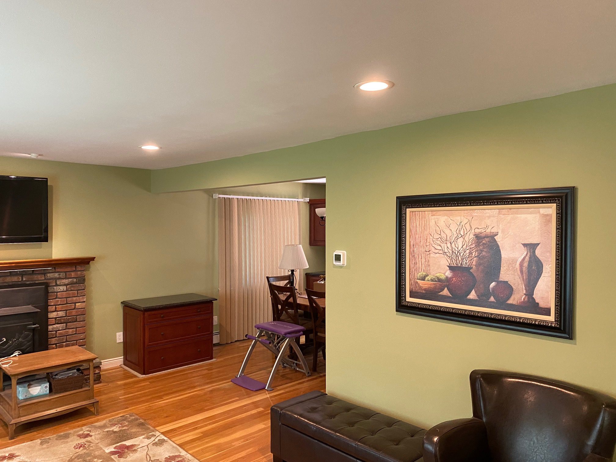 Cozy living room with fireplace and artwork